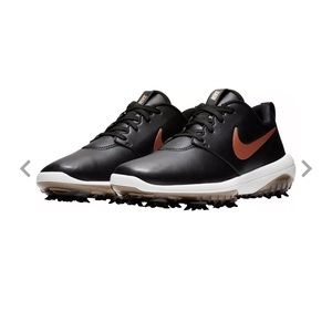 Womens black Nike golf shoes. Size 8. Rose gold Nike symbol- so pretty!!